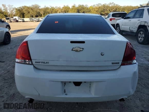 2012 Chevrolet Impala Police Police with VIN 2G1WD5E37C1323042, listed as a Copart auction lot 87278824 with Not provided miles and Salvage title. Bid and sale history available at DreamBid. Image 6.