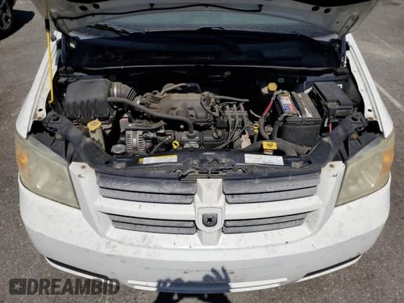 2008 Dodge Grand Caravan SE с VIN 2D8HN44H38R122141, выставлен на аукционе Copart как лот 70930625 с пробегом 169 379 миль миль и Списание • Salvage title. История ставок и продаж доступна на DreamBid. Изображение 12.