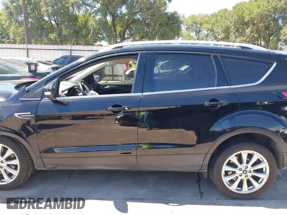 2017 Ford Escape Titanium with VIN 1FMCU0J97HUE26024, listed as a IAAI auction lot 42828848 with 67,634 mi miles and . Bid and sale history available at DreamBid. Image 14.