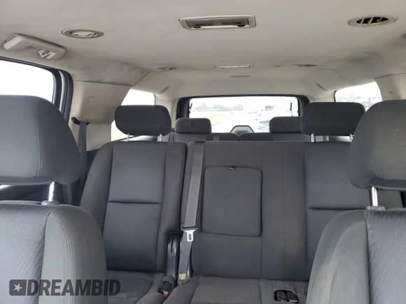 2010 Chevrolet Suburban LS с VIN 1GNUCHE05AR183058, выставлен на аукционе Copart как лот 89012175 с пробегом 236 493 миль миль и Списание • Salvage title. История ставок и продаж доступна на DreamBid. Изображение 10.