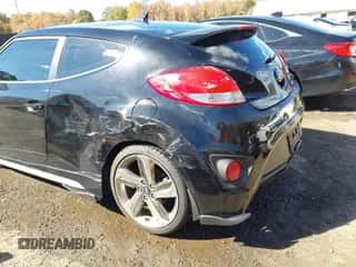 2013 Hyundai Veloster Turbo z VIN KMHTC6AE8DU156928, wystawiony jako IAAI lot #43471857 z przebiegiem 103 265 mil mil oraz . Historia ofert i sprzedaży dostępna na DreamBid. Obrazek 6.
