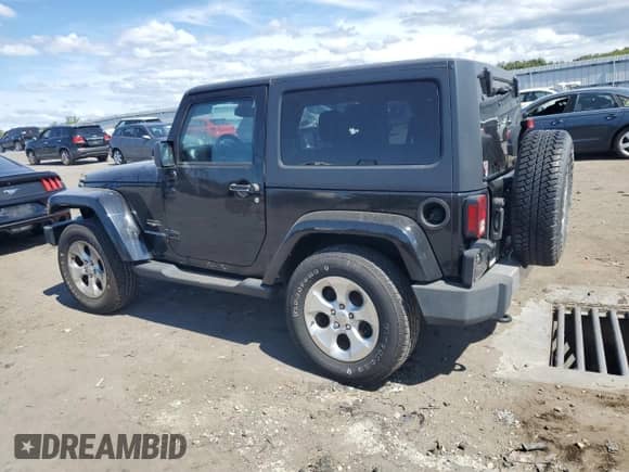 2014 Jeep Wrangler Sahara z VIN 1C4AJWBG4EL196867, wystawiony jako Copart lot #71590205 z przebiegiem 121 968 mil mil oraz Szkoda całkowita • Salvage title. Historia ofert i sprzedaży dostępna na DreamBid. Obrazek 2.
