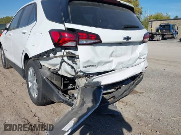 2024 Chevrolet Equinox LT with VIN 3GNAXUEG2RS236482, listed as a IAAI auction lot 43376267 with 19,685 mi miles and . Bid and sale history available at DreamBid. Image 18.