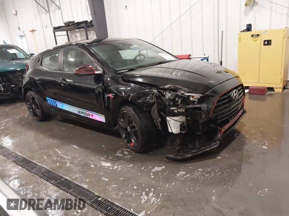 2019 Hyundai Veloster 2.0 z VIN KMHTG6AFXKU011920, wystawiony jako IAAI lot #42105210 z przebiegiem 48 928 mil mil oraz . Historia ofert i sprzedaży dostępna na DreamBid. Obrazek 1.