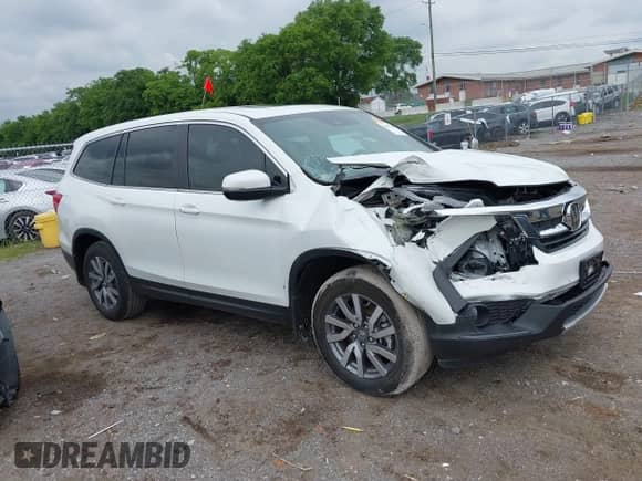 2022 Honda Pilot EX-L z VIN 5FNYF5H52NB003232, wystawiony jako IAAI lot #42341105 z przebiegiem 16 864 mil mil oraz . Historia ofert i sprzedaży dostępna na DreamBid. Obrazek 13.