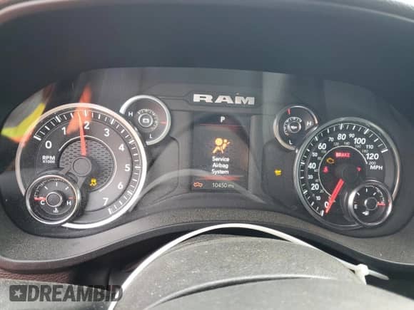 2025 Ram 1500 Tradesman with VIN 1C6RRFGG5SN592771, listed as a Copart auction lot 59027905 with 10,450 mi miles and Salvage title. Bid and sale history available at DreamBid. Image 9.