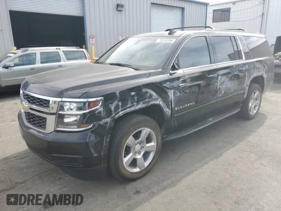 2019 Chevrolet Suburban LS with VIN 1GNSCGKC2KR297407, listed as a Copart auction lot 75224194 with 93,562 mi miles and Salvage title. Bid and sale history available at DreamBid. Image 1.