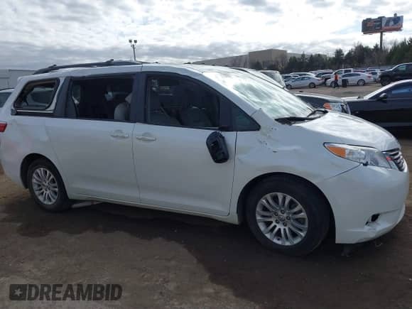 2016 Toyota Sienna XLE with VIN 5TDYK3DC8GS738204, listed as a IAAI auction lot 41105430 with 109,248 mi miles and . Bid and sale history available at DreamBid. Image 13.