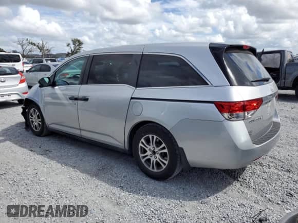 2015 Honda Odyssey LX with VIN 5FNRL5H22FB025431, listed as a Copart auction lot 82373215 with 112,487 mi miles and Salvage title. Bid and sale history available at DreamBid. Image 2.