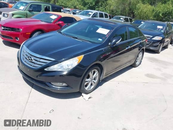2013 Hyundai Sonata SE with VIN 5NPEC4AC4DH533247, listed as a IAAI auction lot 42851232 with 210,916 mi miles and . Bid and sale history available at DreamBid. Image 2.