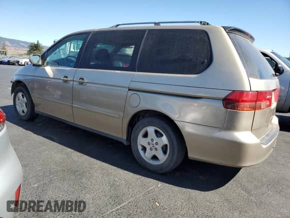 2001 Honda Odyssey EX с VIN 2HKRL18651H556712, выставлен на аукционе Copart как лот 71880255 с пробегом 286 773 миль миль и Списание • Salvage title. История ставок и продаж доступна на DreamBid. Изображение 2.