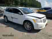 2011 Dodge Caliber Heat with VIN 1B3CB5HA9BD186491, listed as a Copart auction lot 70537895 with 109,284 mi miles and Salvage title. Bid and sale history available at DreamBid. Image 4.