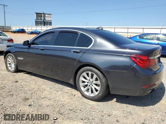 2015 BMW 7 Series 740i с VIN WBAYA6C52FD827068, выставлен на аукционе Copart как лот 61811055 с пробегом 192 299 миль миль и Списание • Salvage title. История ставок и продаж доступна на DreamBid. Изображение 2.