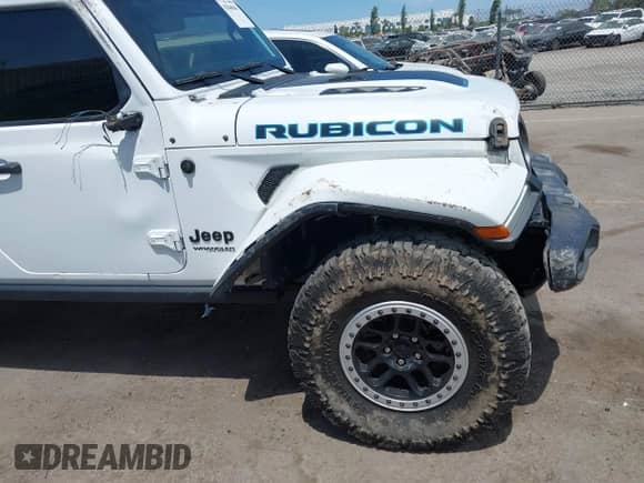 2021 Jeep Wrangler Unlimited Willys with VIN 1C4HJXDN7MW665690, listed as a IAAI auction lot 43040841 with 47,706 mi miles and . Bid and sale history available at DreamBid. Image 12.