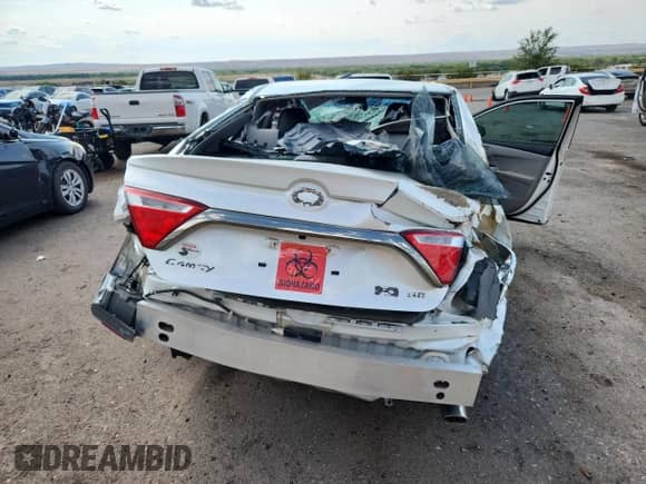 2015 Toyota Camry LE с VIN 4T1BD1FK1FU175186, выставлен на аукционе Copart как лот 69825435 с пробегом Не указан миль и Списание • Salvage title. История ставок и продаж доступна на DreamBid. Изображение 6.