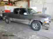 2000 Chevrolet Silverado 1500 LS with VIN 2GCEK19T6Y1179244, listed as a Copart auction lot 54446474 with 199,428 mi miles and Clean title. Bid and sale history available at DreamBid. Image 4.