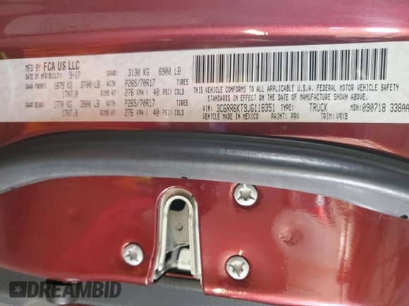 2018 Ram 1500 Tradesman z VIN 3C6RR6KT9JG118351, wystawiony jako Copart lot #47204225 z przebiegiem 107 356 mil mil oraz Szkoda całkowita • Salvage title. Historia ofert i sprzedaży dostępna na DreamBid. Obrazek 13.