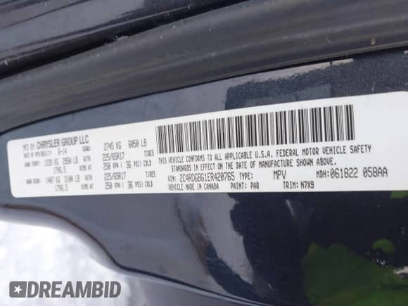2014 Dodge Grand Caravan SXT with VIN 2C4RDGBG1ER420765, listed as a IAAI auction lot 40986661 with 167,365 mi miles and . Bid and sale history available at DreamBid. Image 9.