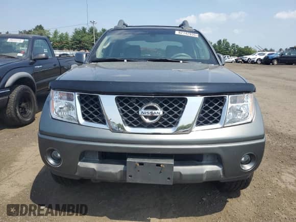 2005 Nissan Frontier LE с VIN 1N6AD07W25C449928, выставлен на аукционе Copart как лот 62142935 с пробегом 91 924 миль миль и Чистый • Clean title. История ставок и продаж доступна на DreamBid. Изображение 5.