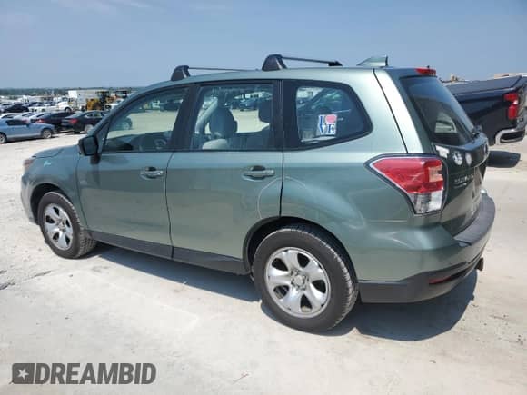 2017 Subaru Forester with VIN JF2SJAACXHG457987, listed as a Copart auction lot 67264085 with 136,942 mi miles and Salvage title. Bid and sale history available at DreamBid. Image 2.