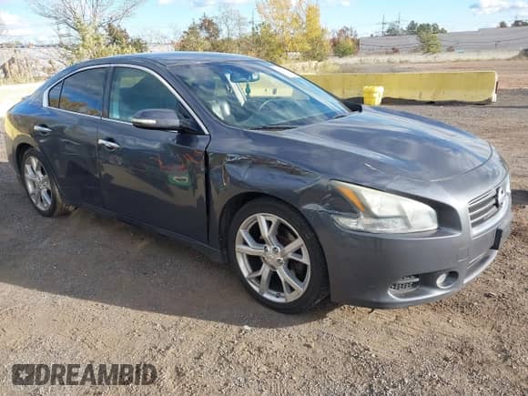 2012 Nissan Maxima SV z VIN 1N4AA5AP6CC833515, wystawiony jako IAAI lot #43527151 z przebiegiem 154 276 mil mil oraz . Historia ofert i sprzedaży dostępna na DreamBid. Obrazek 1.