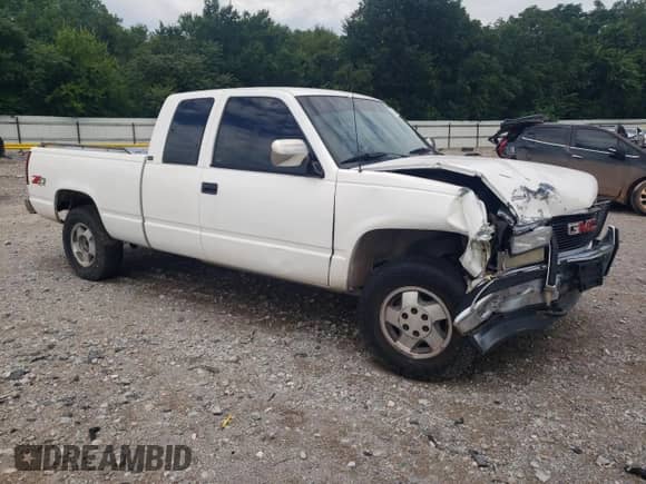 1992 GMC Sierra 1500 с VIN 2GTEK19K9N1554773, выставлен на аукционе Copart как лот 62872005 с пробегом 178 663 миль миль и Списание • Salvage title. История ставок и продаж доступна на DreamBid. Изображение 4.