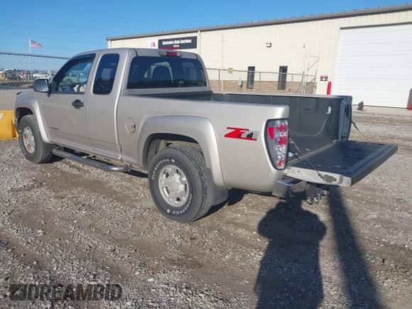 2005 Chevrolet Colorado LS Z71 z VIN 1GCDS196758119567, wystawiony jako IAAI lot #41597821 z przebiegiem 194 611 mil mil oraz . Historia ofert i sprzedaży dostępna na DreamBid. Obrazek 3.