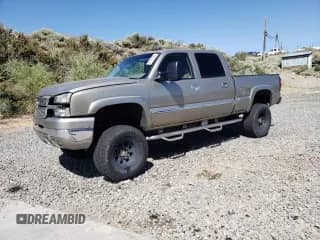 2003 Chevrolet Silverado 2500HD LS с VIN 1GCHK23133F114069, выставлен на аукционе Copart как лот 61617665 с пробегом 245 921 миль миль и Списание • Salvage title. История ставок и продаж доступна на DreamBid. Изображение 1.