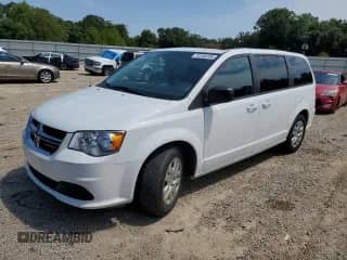 2018 Dodge Grand Caravan SE with VIN 2C4RDGBG2JR148110, listed as a Copart auction lot 70198185 with 86,779 mi miles and Salvage title. Bid and sale history available at DreamBid. Image 1.