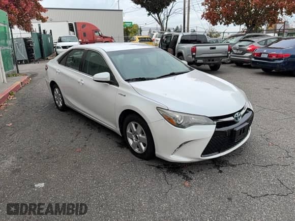 2015 Toyota Camry LE z VIN 4T1BD1FK3FU168482, wystawiony jako Copart lot #91081815 z przebiegiem 263 499 mil mil oraz Czysty tytuł • Clean title. Historia ofert i sprzedaży dostępna na DreamBid. Obrazek 1.