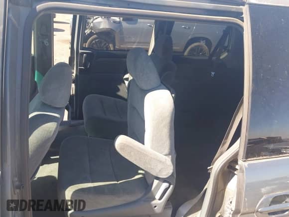 2001 Honda Odyssey EX z VIN 2HKRL18601H610966, wystawiony jako IAAI lot #43380576 z przebiegiem 184 426 mil mil oraz . Historia ofert i sprzedaży dostępna na DreamBid. Obrazek 8.