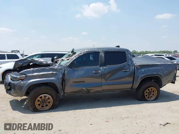 2021 Toyota Tacoma SR5 with VIN 5TFAZ5CN1MX118036, listed as a IAAI auction lot 42840652 with 73,082 mi miles and . Bid and sale history available at DreamBid. Image 14.