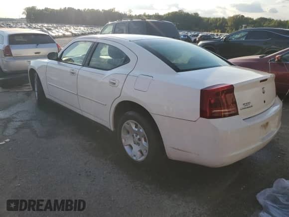 2007 Dodge Charger z VIN 2B3KA43G47H801754, wystawiony jako Copart lot #74102764 z przebiegiem 335 556 mil mil oraz Szkoda całkowita • Salvage title. Historia ofert i sprzedaży dostępna na DreamBid. Obrazek 2.