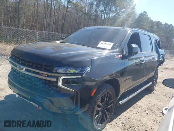 2022 Chevrolet Suburban Z71 with VIN 1GNSKDKD5NR110949, listed as a IAAI auction lot 41556533 with 68,141 mi miles and . Bid and sale history available at DreamBid. Image 2.