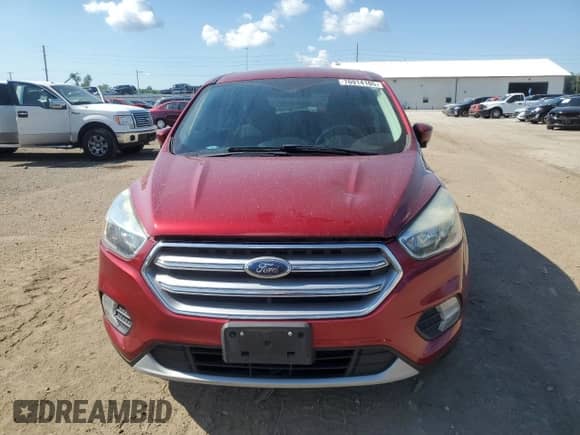 2017 Ford Escape SE с VIN 1FMCU9GD8HUC66378, выставлен на аукционе Copart как лот 70914105 с пробегом 136 895 миль миль и Списание • Salvage title. История ставок и продаж доступна на DreamBid. Изображение 5.