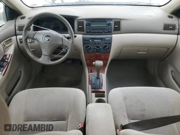 2005 Toyota Corolla LE z VIN 1NXBR32E05Z377819, wystawiony jako Copart lot #85673395 z przebiegiem 299 999 mil mil oraz Szkoda całkowita • Salvage title. Historia ofert i sprzedaży dostępna na DreamBid. Obrazek 8.