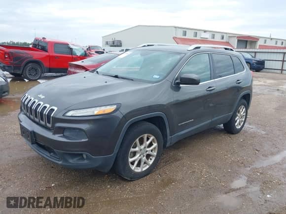 2014 Jeep Cherokee Latitude with VIN 1C4PJMCBXEW250804, listed as a IAAI auction lot 41874944 with 93,171 mi miles and . Bid and sale history available at DreamBid. Image 2.