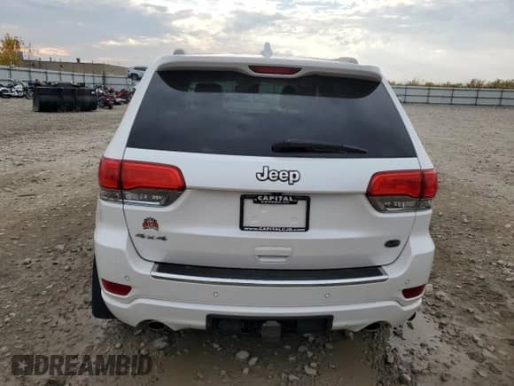 2016 Jeep Grand Cherokee Overland z VIN 1C4RJFCG7GC409038, wystawiony jako Copart lot #86667295 z przebiegiem 192 065 mil mil oraz Czysty tytuł • Clean title. Historia ofert i sprzedaży dostępna na DreamBid. Obrazek 6.