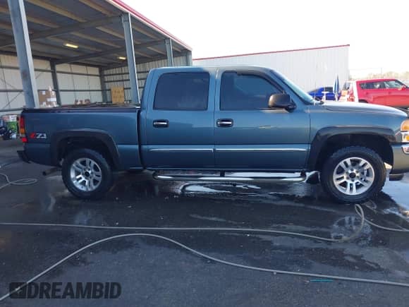 2006 GMC Sierra 1500 SLT with VIN 2GTEK13Z561315535, listed as a IAAI auction lot 41386813 with Not provided miles and . Bid and sale history available at DreamBid. Image 13.