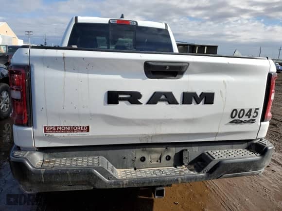 2025 Ram 1500 Tradesman with VIN 1C6RRFGG8SN608803, listed as a Copart auction lot 42578305 with 4,864 mi miles and Salvage title. Bid and sale history available at DreamBid. Image 6.