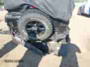 2021 Jeep Wrangler Unlimited 80th Anniversary with VIN 1C4HJXDG5MW514123, listed as a IAAI auction lot 43119876 with 60,640 mi miles and . Bid and sale history available at DreamBid. Image 6.