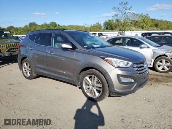 2015 Hyundai Santa Fe с VIN 5XYZWDLA6FG262626, выставлен на аукционе Copart как лот 71269715 с пробегом 175 068 миль миль и Чистый • Clean title. История ставок и продаж доступна на DreamBid. Изображение 4.