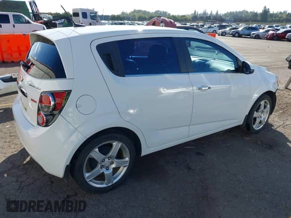 2014 Chevrolet Sonic LTZ с VIN 1G1JE6SB8E4227548, выставлен на аукционе IAAI как лот 43316295 с пробегом 59 646 миль миль и . История ставок и продаж доступна на DreamBid. Изображение 4.