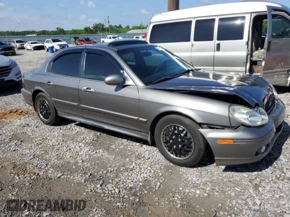 2003 Hyundai Sonata с VIN KMHWF25S43A729465, выставлен на аукционе Copart как лот 57914175 с пробегом 202 586 миль миль и Списание • Salvage title. История ставок и продаж доступна на DreamBid. Изображение 4.