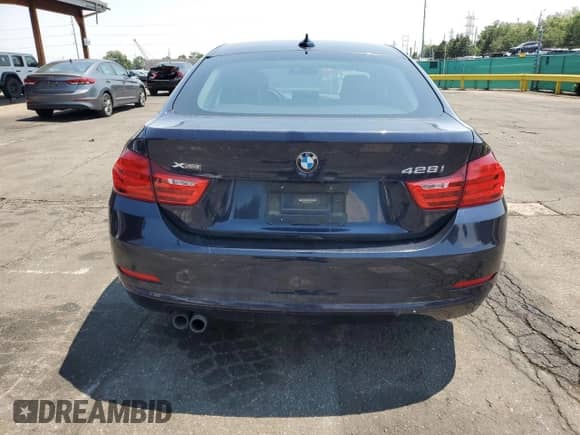 2016 BMW 4 Series 428i xDrive z VIN WBA4C9C50GG140732, wystawiony jako Copart lot #66198135 z przebiegiem 80 977 mil mil oraz Szkoda całkowita • Salvage title. Historia ofert i sprzedaży dostępna na DreamBid. Obrazek 6.