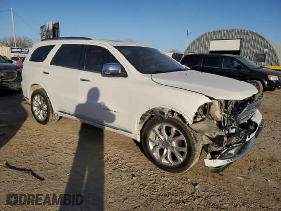 2016 Dodge Durango Citadel Anodized Platinum with VIN 1C4SDJET1GC424883, listed as a Copart auction lot 84747874 with 162,989 mi miles and Salvage title. Bid and sale history available at DreamBid. Image 4.