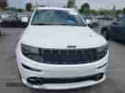 2014 Jeep Grand Cherokee SRT-8 z VIN 1C4RJFDJ7EC536055, wystawiony jako IAAI lot #42194498 z przebiegiem 80 241 mil mil oraz . Historia ofert i sprzedaży dostępna na DreamBid. Obrazek 12.