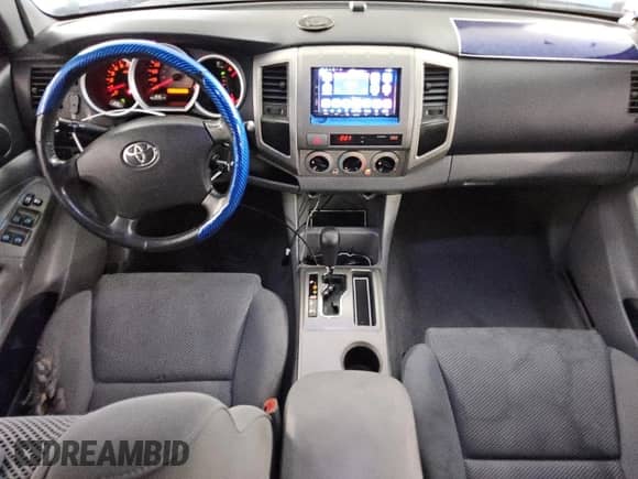 2005 Toyota Tacoma PreRunner with VIN 3TMJU62N05M002100, listed as a Copart auction lot 84837805 with 300,227 mi miles and Clean title. Bid and sale history available at DreamBid. Image 8.
