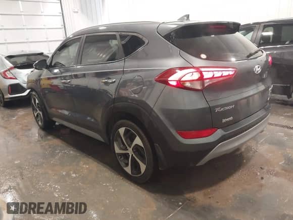 2018 Hyundai Tucson Value z VIN KM8J33A28JU615981, wystawiony jako IAAI lot #42281881 z przebiegiem 71 835 mil mil oraz . Historia ofert i sprzedaży dostępna na DreamBid. Obrazek 3.