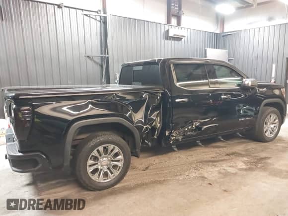 2020 GMC Sierra 1500 Denali with VIN 3GTU9FED5LG294615, listed as a IAAI auction lot 41932141 with 85,049 mi miles and . Bid and sale history available at DreamBid. Image 6.